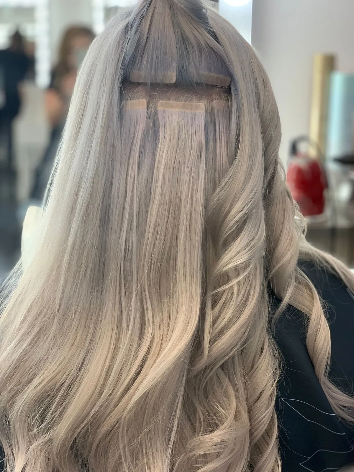 Tape In Hair Extensions in Louisville Emma Justine Salon